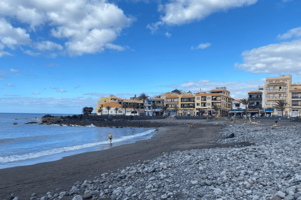 Playa De La Calera With Sand And Pebble With Restaurants In Background On Sunny Day One Of Best Beaches In Valle Gran Rey La Gomera Canary Islands Spain